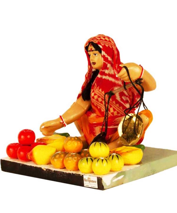 fruit seller statue
