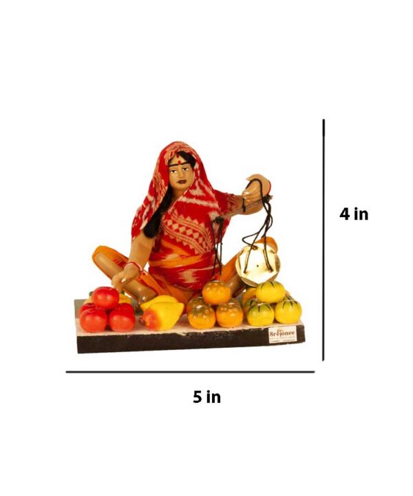 fruit seller miniature statue