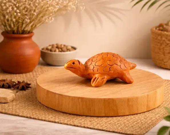 Cute handmade terracotta turtle décor for Terracotta Home Decor In Kolkata displayed with earthy and rustic styling.